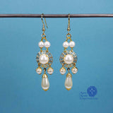 lady aurora earrings teardrop pearls and gold filigree
