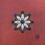 renaissance pin sapphire and starburst pearl pin