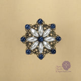 renaissance pin sapphire and starburst pearl pin