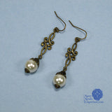 Nicolette pearl Renaissance scroll earrings bronze