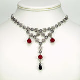 silver celtic knot necklace red crystal Torrin Red