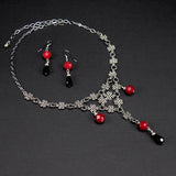 silver celtic knot necklace red crystal Torrin Red