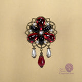 Baroness Ladonna red Renaissance pin in bronze